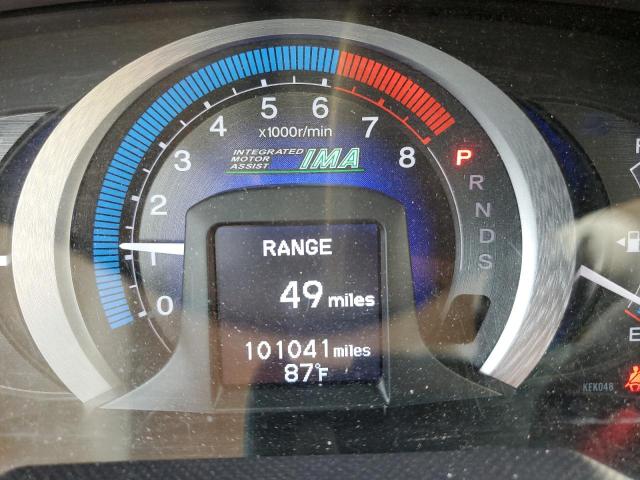 Photo 8 from auction – 2010 HONDA INSIGHT EX with VIN JHMZE2H71AS024270