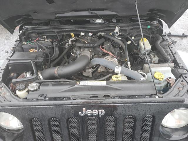 Photo 7 from auction – 2009 JEEP 8705F with VIN 1J4GA64179L744444