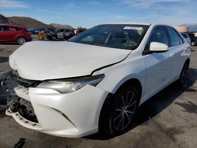Photo 2 from auction – 2015 TOYOTA CAMRY LE with VIN 4T1BF1FK3FU031990