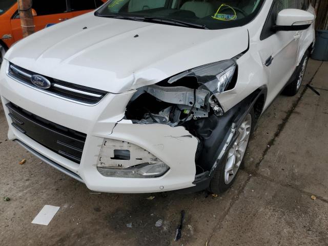 Photo 9 from auction – 2014 FORD ESCAPE TIT with VIN 1FMCU9JX2EUC72739