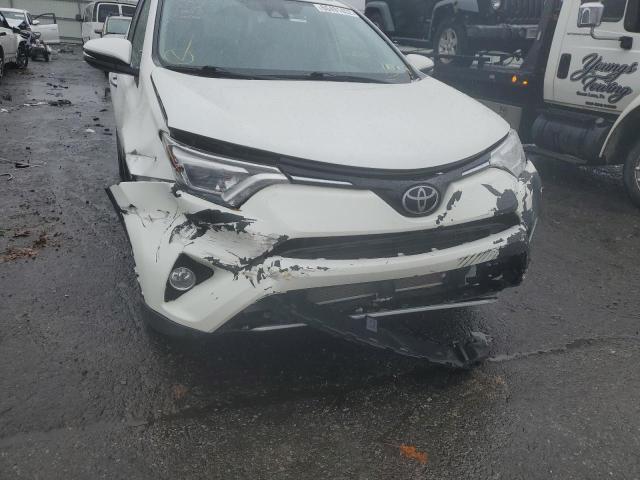 Photo 9 from auction – 2018 TOYOTA RAV4 LIMIT with VIN JTMDFREV9JD246130