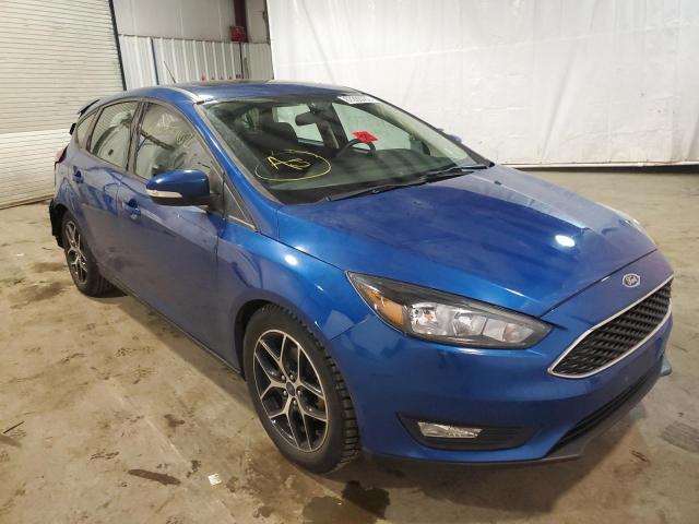 FORD FOCUS 2018 with VIN 1FADP3M24JL214053 - Photo from auction