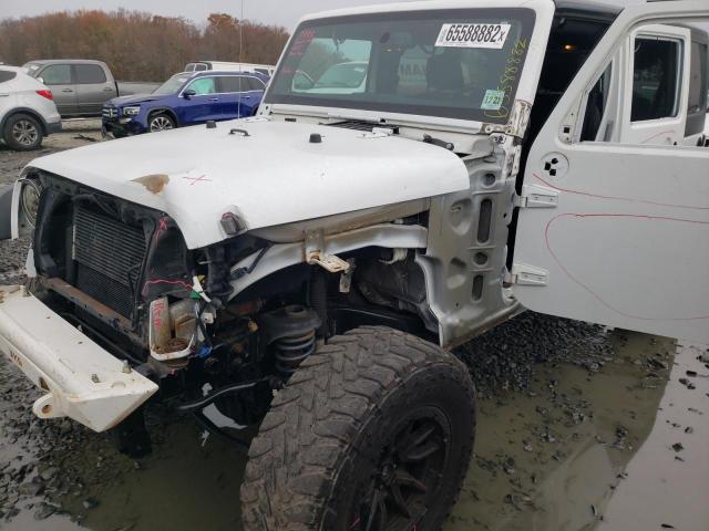 Photo 9 from auction – 2016 JEEP WRANGLER U with VIN 1C4BJWDG4GL161430