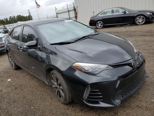 TOYOTA COROLLA L 2018 with VIN 5YFBURHE9JP831019 - Photo from auction
