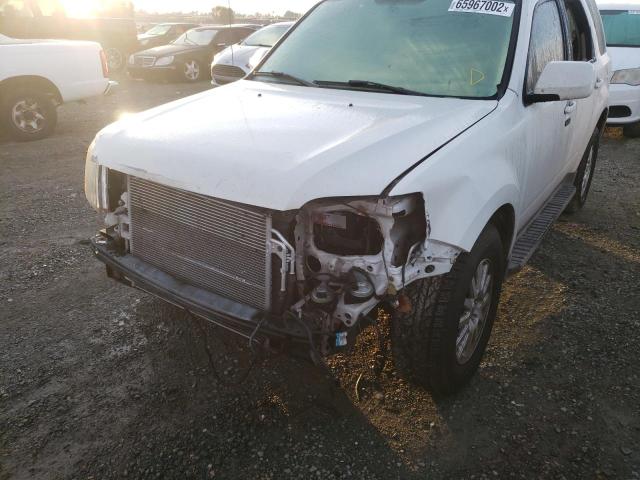 Photo 9 from auction – 2011 MERCURY MARINER PR with VIN 4M2CN9HG4BKJ01435
