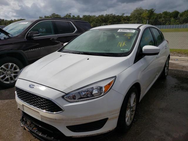 Photo 2 from auction – 2018 FORD FOCUS SE with VIN 1FADP3K23JL256619