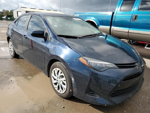 TOYOTA COROLLA L 2019 with VIN 5YFBURHE4KP882283 - Photo from auction