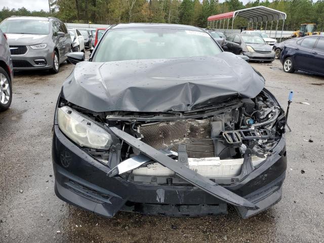 Photo 9 from auction – 2016 HONDA CIVIC LX with VIN 2HGFC2F54GH556528