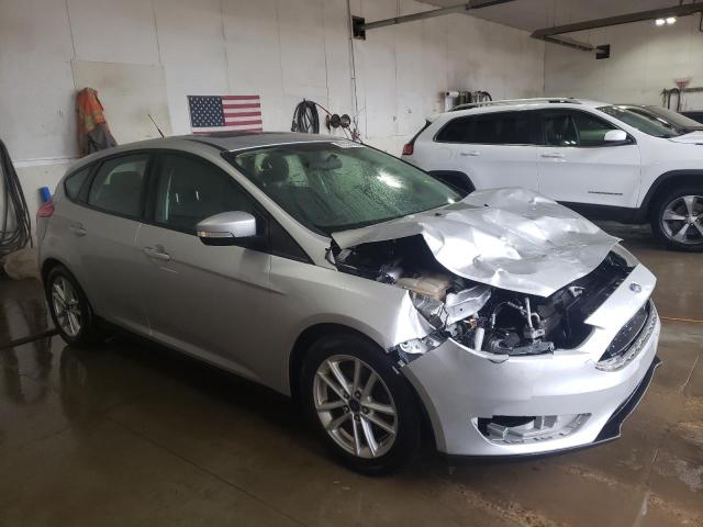 FORD FOCUS SE 2015 with VIN 1FADP3K20FL374344 - Photo from auction
