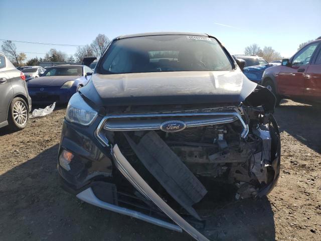 Photo 5 from auction – 2017 FORD ESCAPE SE with VIN 1FMCU9GD0HUD32972