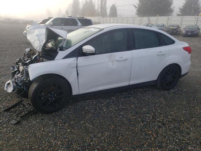 FORD FOCUS SE 2016 with VIN 1FADP3F21GL406357 - Photo from auction