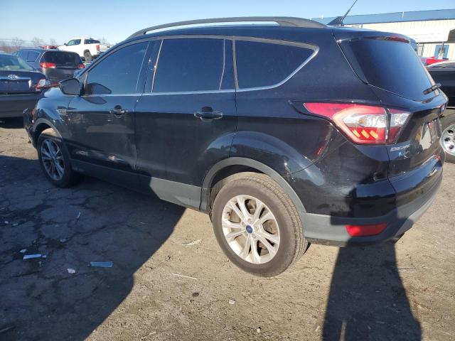 Photo 2 from auction – 2018 FORD ESCAPE SE with VIN 1FMCU9GD7JUB66567