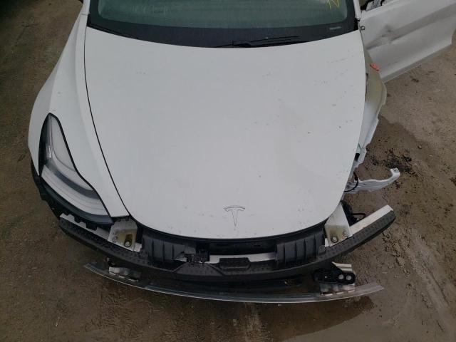 Photo 7 from auction – 2021 TESLA MODEL 3 with VIN 5YJ3E1EA1MF860647