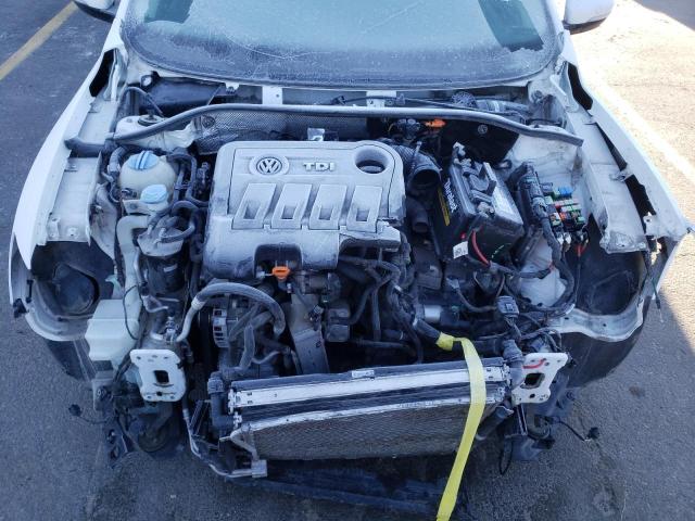 Photo 11 from auction – 2014 VOLKSWAGEN PASSAT SE with VIN 1VWBN7A38EC002870