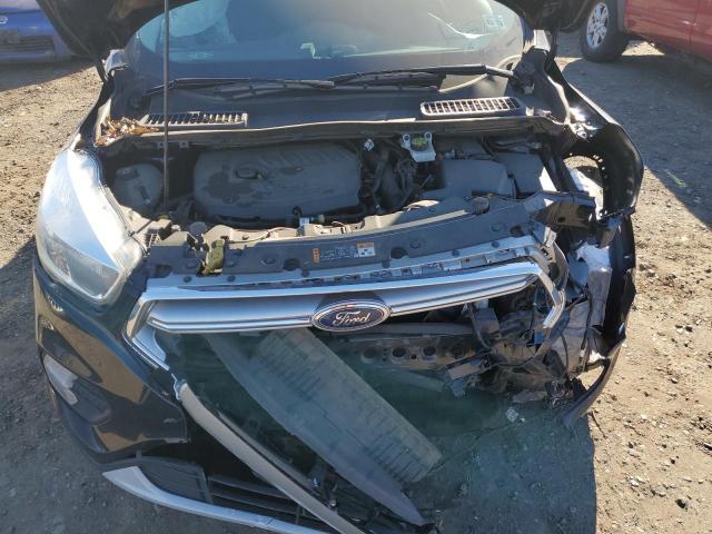 Photo 12 from auction – 2017 FORD ESCAPE SE with VIN 1FMCU9GD0HUD32972