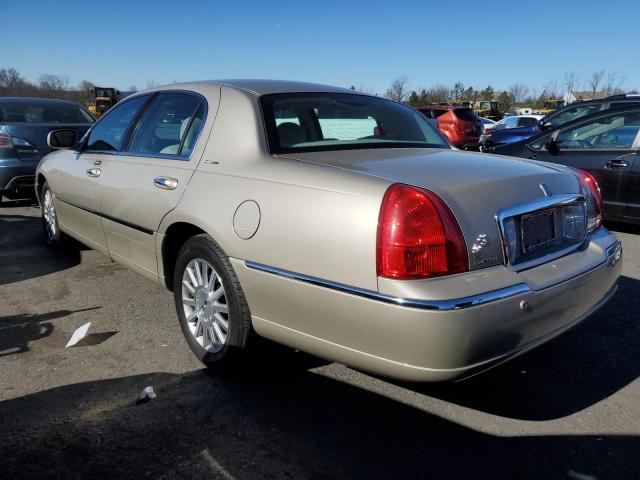 Photo 2 from auction – 2004 LINCOLN TOWN CAR E with VIN 1LNHM81W84Y677423