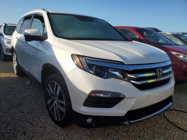 Photo 1 from auction – 2017 HONDA PILOT TOUR with VIN 5FNYF5H97HB013956