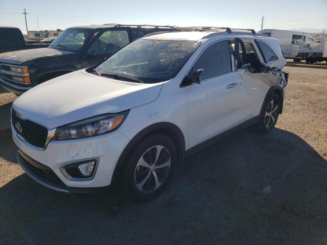 KIA SORENTO EX 2016 with VIN 5XYPH4A52GG169529 - Photo from auction