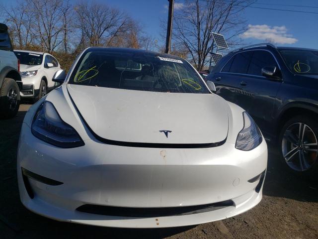 Photo 5 from auction – 2021 TESLA MODEL 3 with VIN 5YJ3E1EA9MF856796