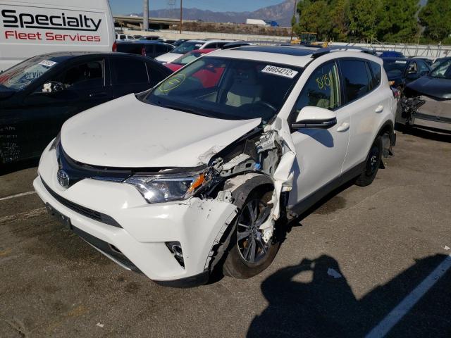 Photo 2 from auction – 2016 TOYOTA RAV4 XLE with VIN JTMWFREV7GD090591