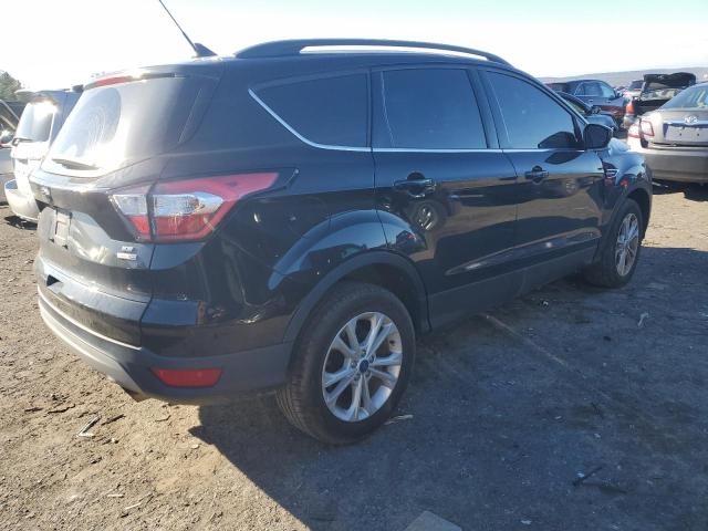 Photo 3 from auction – 2018 FORD ESCAPE SE with VIN 1FMCU9GD7JUB66567