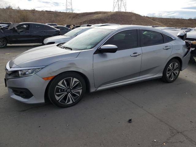 HONDA CIVIC EX 2018 with VIN JHMFC1F34JX036435 - Photo from auction