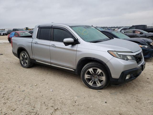 Photo 4 from auction – 2017 HONDA RIDGELINE with VIN 5FPYK2F69HB011183