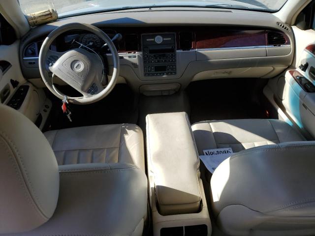 Photo 8 from auction – 2004 LINCOLN TOWN CAR E with VIN 1LNHM81W84Y677423