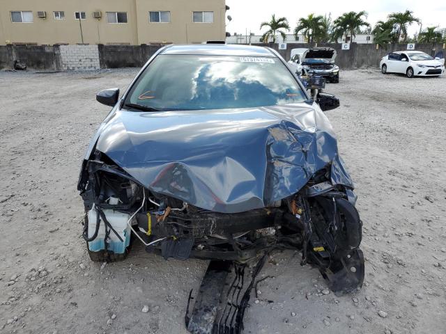 Photo 5 from auction – 2014 TOYOTA COROLLA L with VIN 2T1BURHE0EC058091