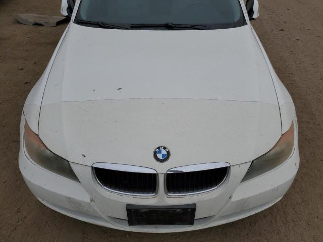 Photo 11 from auction – 2006 BMW 325 I with VIN WBAVB13526KX49583