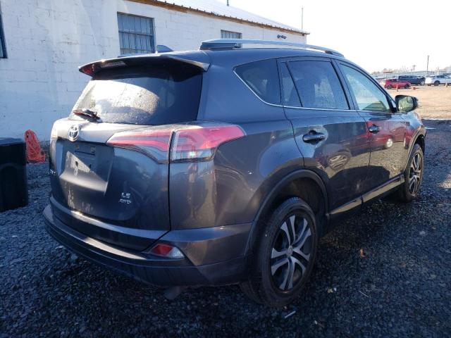 Photo 3 from auction – 2018 TOYOTA RAV4 LE with VIN JTMBFREV5JJ741868