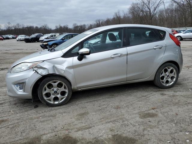 FORD FIESTA SES 2011 with VIN 3FADP4FJ2BM119551 - Photo from auction
