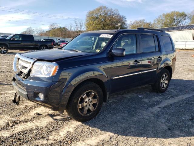 HONDA PILOT TOUR 2011 with VIN 5FNYF4H98BB027740 - Photo from auction