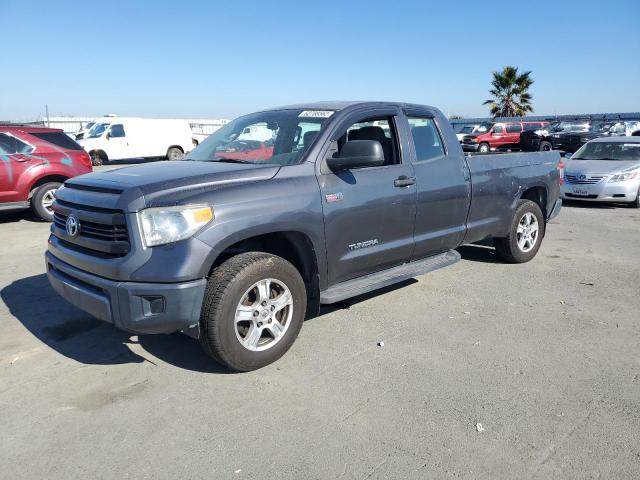 TOYOTA TUNDRA DOU 2014 with VIN 5TFTY5F11EX008576 - Photo from auction