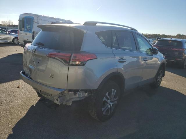 Photo 3 from auction – 2018 TOYOTA RAV4 LE with VIN 2T3BFREV4JW850310