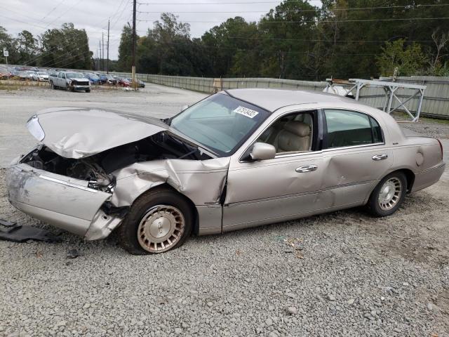 LINCOLN TOWN CAR E 1999 with VIN 1LNHM81W6XY628192 - Photo from auction