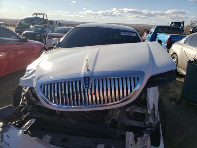 Photo 5 from auction – 2004 LINCOLN TOWN CAR E with VIN 1LNHM81W64Y649474