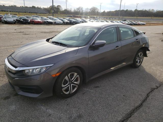 HONDA CIVIC LX 2018 with VIN 2HGFC2F58JH570312 - Photo from auction