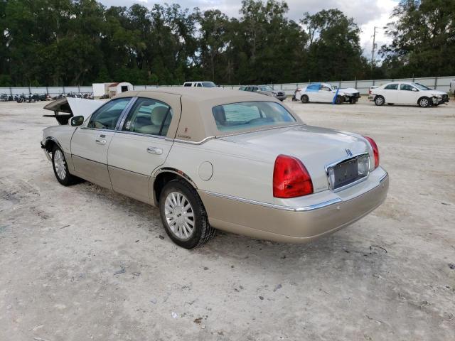 Photo 3 from auction – 2004 LINCOLN TOWN CAR E with VIN 1LNHM81W64Y687786