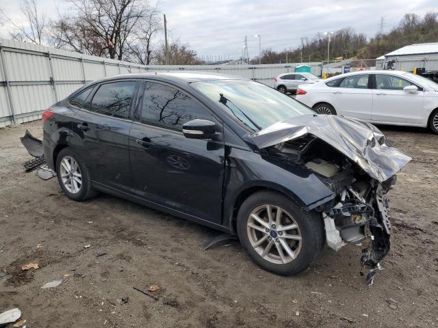 Photo 4 from auction – 2016 FORD FOCUS SE with VIN 1FADP3F21GL329666