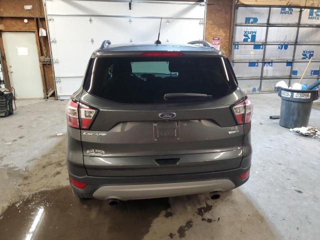 Photo 6 from auction – 2018 FORD ESCAPE SE with VIN 1FMCU9GD6JUA65410