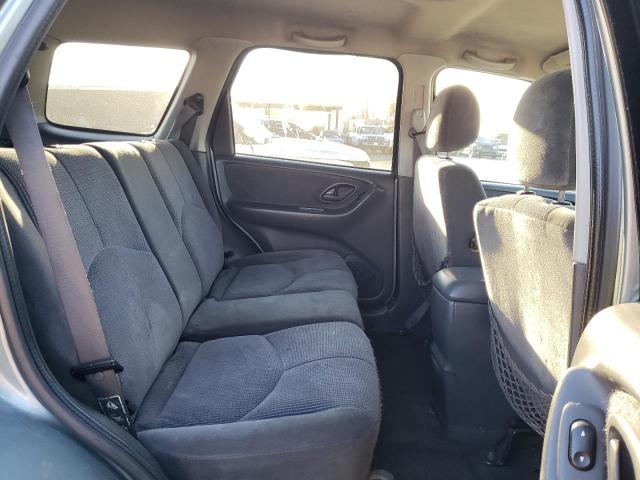 Photo 11 from auction – 2003 MAZDA TRIBUTE LX with VIN 4F2CZ04153KM27012