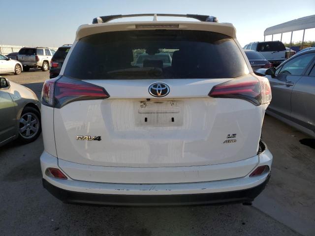Photo 6 from auction – 2017 TOYOTA RAV4 LE with VIN JTMBFREV6HJ147252