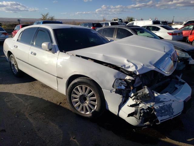 Photo 4 from auction – 2004 LINCOLN TOWN CAR E with VIN 1LNHM81W64Y649474