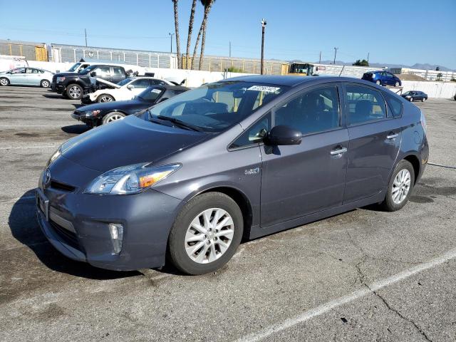 TOYOTA PRIUS PLUG 2014 with VIN JTDKN3DPXE3050638 - Photo from auction