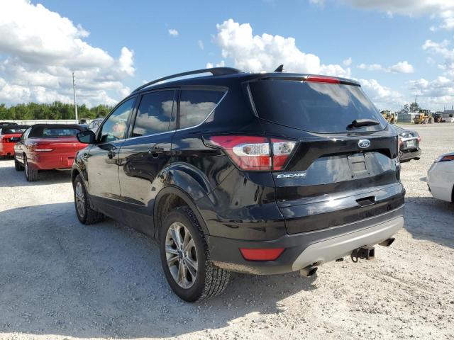 Photo 3 from auction – 2018 FORD ESCAPE SE with VIN 1FMCU9GD8JUA53534