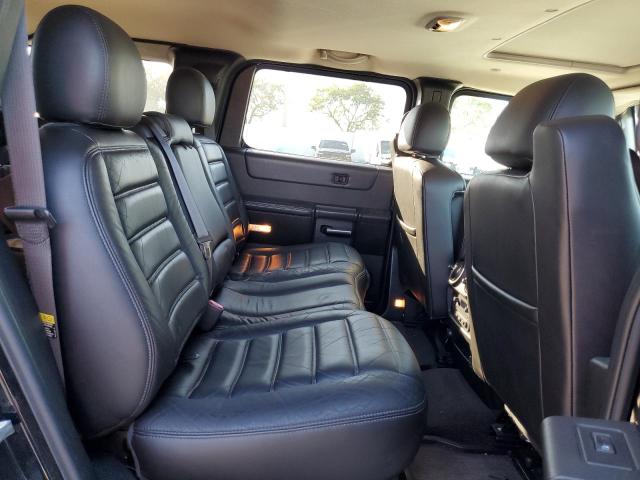 Photo 11 from auction – 2006 HUMMER H2 with VIN 5GRGN23U86H102388