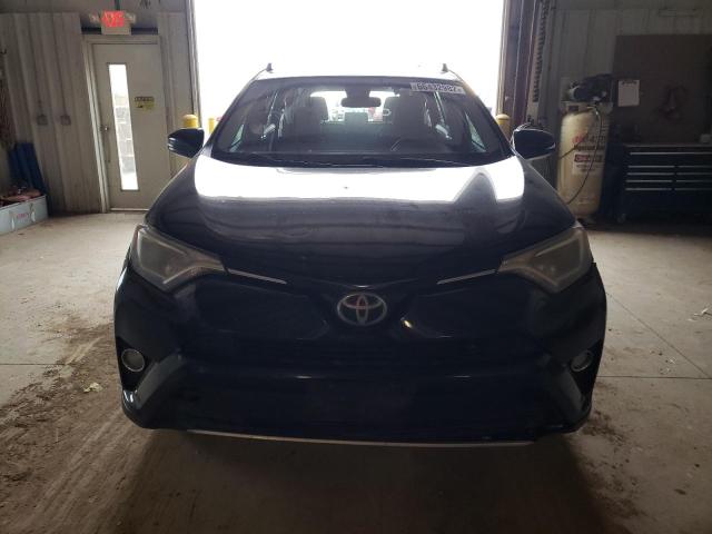 Photo 5 from auction – 2017 TOYOTA RAV4 XLE with VIN 2T3RFREV7HW580451