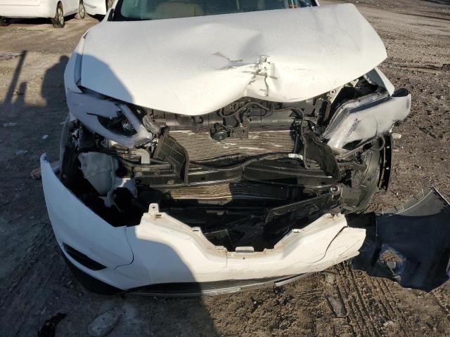 Photo 9 from auction – 2015 NISSAN ROGUE S with VIN KNMAT2MV0FP570688