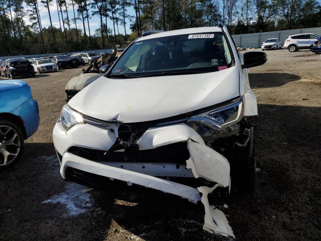 Photo 5 from auction – 2018 TOYOTA RAV4 LE with VIN JTMZFREV0JJ154136